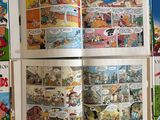 a lot of comic books on the table