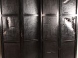a black room divider that has been painted black