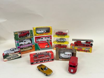 a lot of toy cars that are sitting on a table