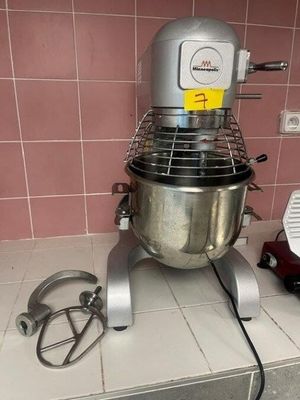 an image of a mixer on a counter in a kitchen