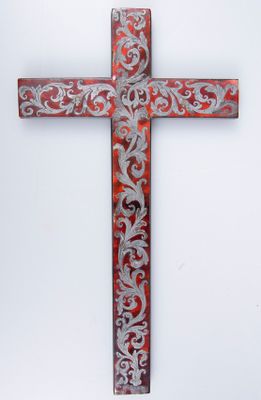 une image représentant une croix rouge et argentée sur fond blanc