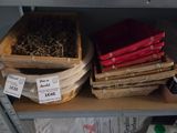 many baskets of different types of herbs on a shelf