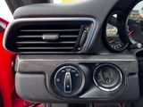a close up of a car ' s dashboard with the controls on