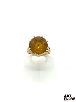 Bague en or jaune 18 k (750/1000) ornée d'une pierre jaune. …