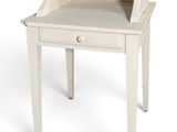 an image of a white desk with a drawer on it