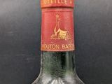 a bottle of wine that is sitting on a table