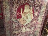 a rug that has a picture of a woman on it