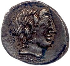 pièce de monnaie en argent portant l'image d'une tête d'homme