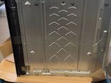 a large metal box on a cart in a warehouse