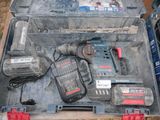 a tool box with tools in it sitting on the ground