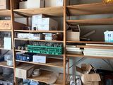 a room with a lot of boxes and boxes on the shelves