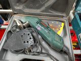 a tool in a case that is sitting on top of a table