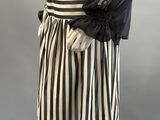 black and white striped dress with sheer sleeves on mannequin mannequin mannequin mannequin mannequin mannequin mannequin manne