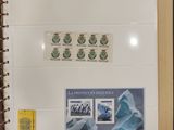 a picture of a picture of an iceberg with stamps on it