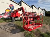 an image of a red scissor parked in front of a building