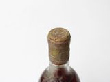 a bottle of wine that is sitting on a table