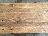 the top of a large piece of wood sitting on top of a table