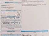 une feuille de papier sur laquelle est dessinée une image d'avion