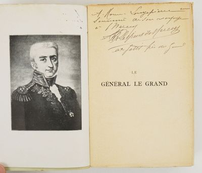someone is holding a book with a picture of a man in a military uniform