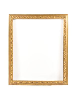 an old gold frame with a decorative pattern on the edges