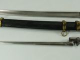 three different types of swords are displayed on a white surface