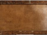 an old wooden picture frame with a sign on it