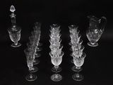 a lot of glass vases that are sitting on a table