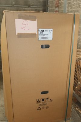 a cardboard box with a sticker on it sitting on a pallet