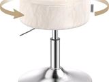 an image of a white stool with a metal base