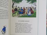 an open book with a picture of a group of people