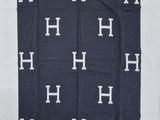 an image of a black and white scarf with white letters on it