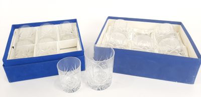 two glasses in a blue box and a glass in a blue box