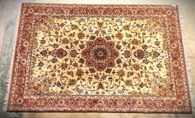a close up of an oriental rug on a floor
