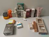 many different types of skin care products laid out on a table