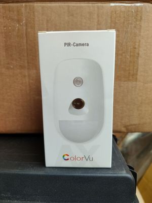 a white box with a camera on top of it