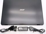 a black laptop with a charger and a power cord
