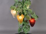 an image of a lamp that has grapes on it