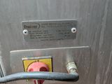an image of a close up of a machine with a red handle