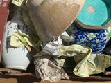 a box full of vases and other items in it