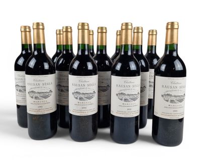 six bottles of red wine are lined up in a row