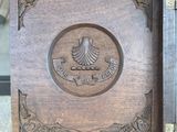 a wooden box with a picture of a bird on it