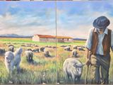 tableau représentant un homme avec des moutons dans un champ, avec une grange en arrière-plan