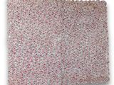 a close up of a crocheted pillow on a white background