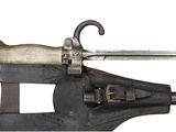 a very old gun that is on display on a white background