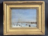 tableau représentant un paysage hivernal, dans un cadre doré sur fond noir