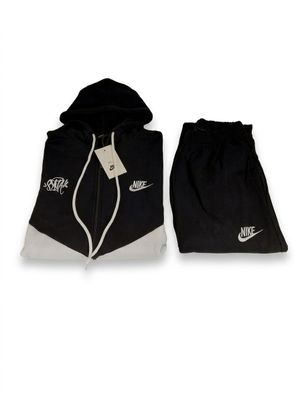 black and white jacket and pants with hoodie on white background