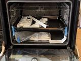a black oven that has some food inside of it