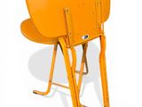an orange chair sitting on top of a metal stand