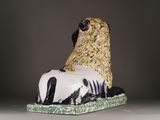 a figurine of a horse that is sitting on a table