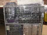 a metal cart with a lot of items in it
